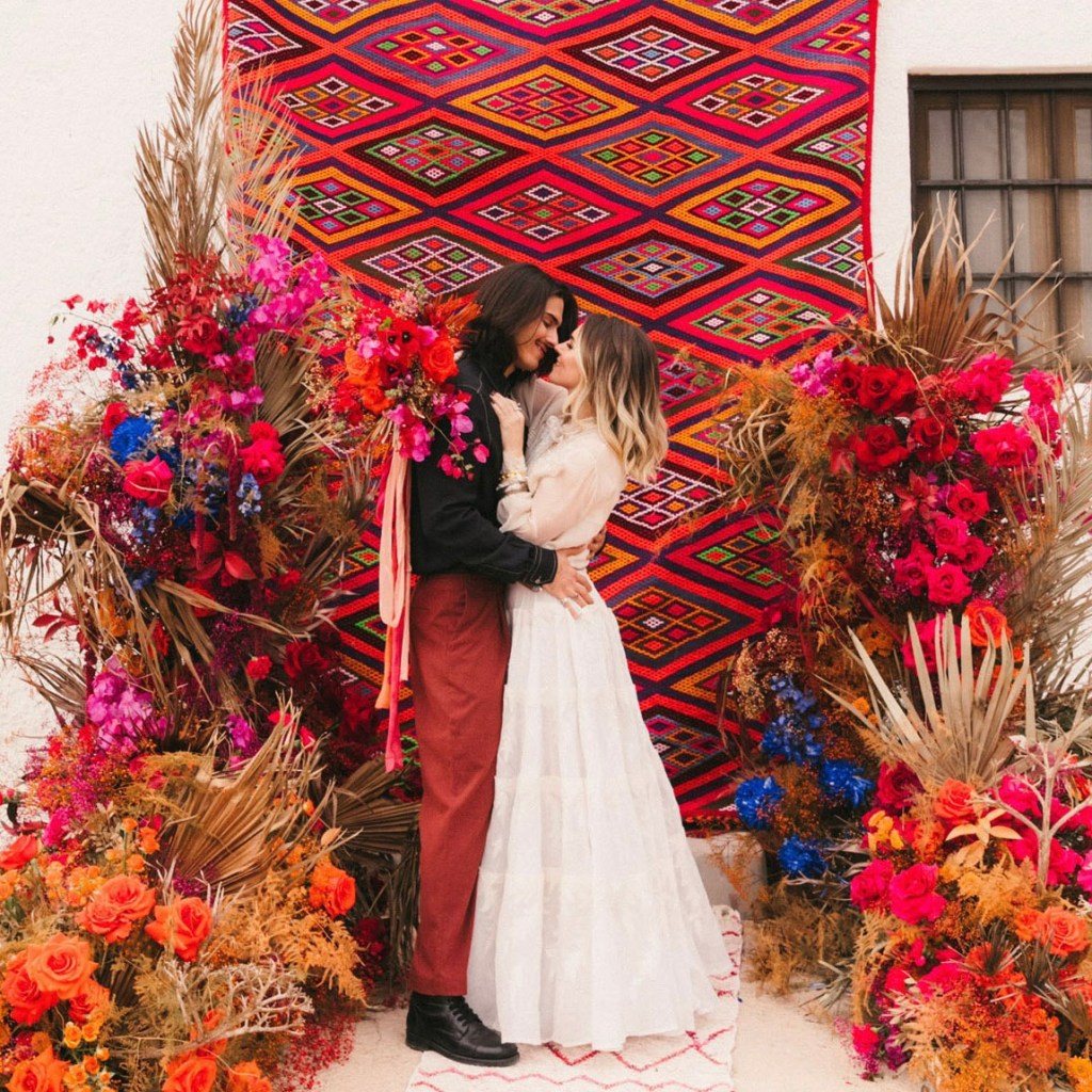 tropical Christmas wedding inspired floral arch idea